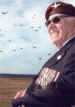 Harry Houghton watching a commemorative parachute drop on DZ-Y