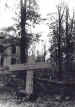 The grave of an airborne soldier outside the Hartenstein Hotel