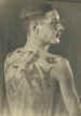 Charles McIlhargey and his "Rock of Ages" tattoo