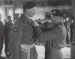 Brigadier Poett receiving the DSO from Field Marshal Montgomery