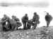 Soldiers helping the survivors of a sunk LCA ashore
