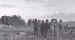 Troops of the 3rd Infantry Division watch the arrival of the Second Lift