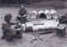 Paratroopers packing PIAT bombs into supply containers before D-Day
